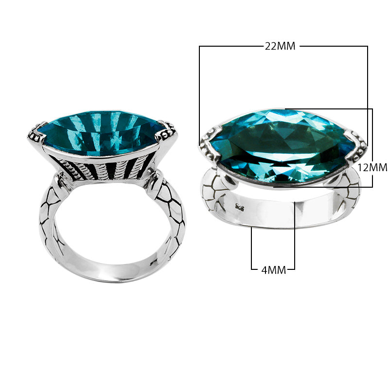 Wholesale sterling silver marquise-cut blue topaz ring with Bali-inspired band design – bulk gemstone statement jewelry for resellers.