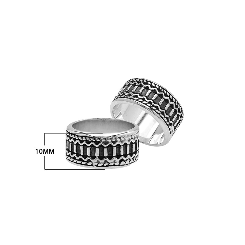 Wholesale sterling silver wide band ring with oxidized Bali-inspired carvings, handcrafted unisex artisan jewelry in bulk for retailers and resellers.