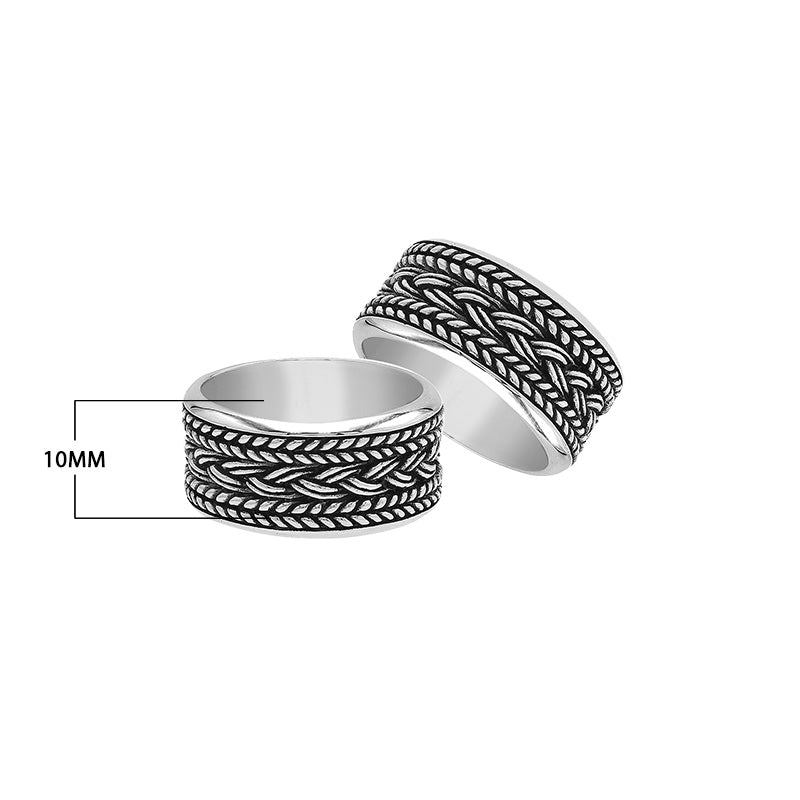 Wholesale sterling silver wide band ring with intricate braided Bali-inspired design and oxidized details, handcrafted unisex artisan jewelry in bulk for retailers and resellers.
