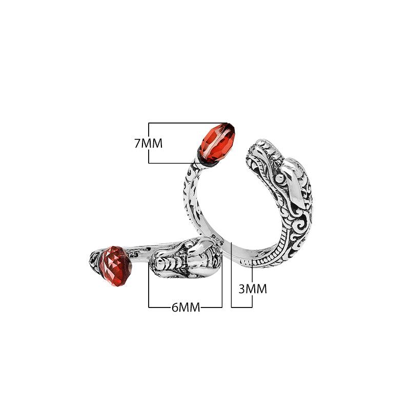 Wholesale sterling silver dragon head bypass ring with faceted Garnet Quartz, handcrafted in Bali with intricate carvings.