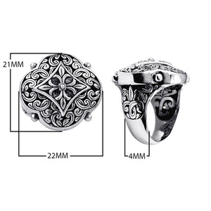 Wholesale sterling silver Balinese statement ring with ornate floral medallion design, oxidized detailing, and handcrafted scroll patterns – artisan jewelry from Bali.