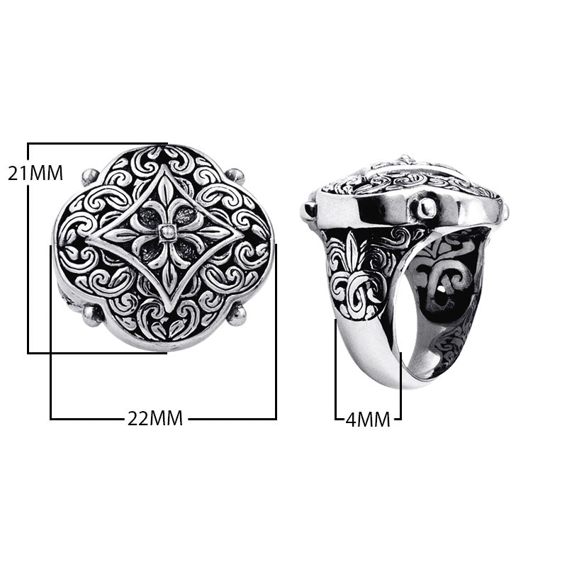 Wholesale sterling silver Balinese statement ring with ornate floral medallion design, oxidized detailing, and handcrafted scroll patterns – artisan jewelry from Bali.