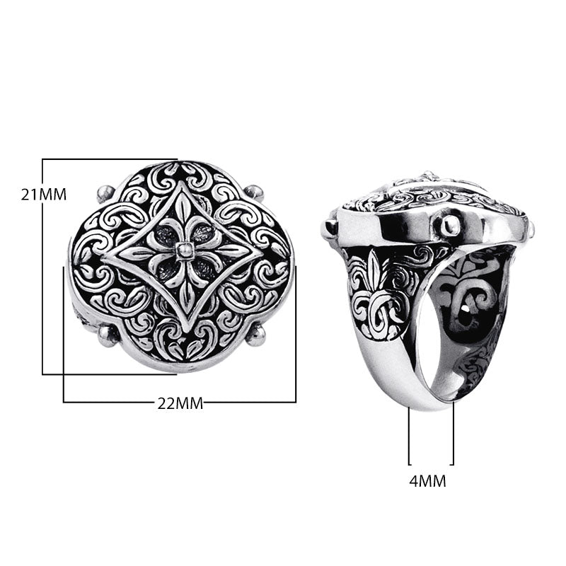 Wholesale sterling silver Balinese statement ring with ornate floral medallion design, oxidized detailing, and handcrafted scroll patterns – artisan jewelry from Bali.
