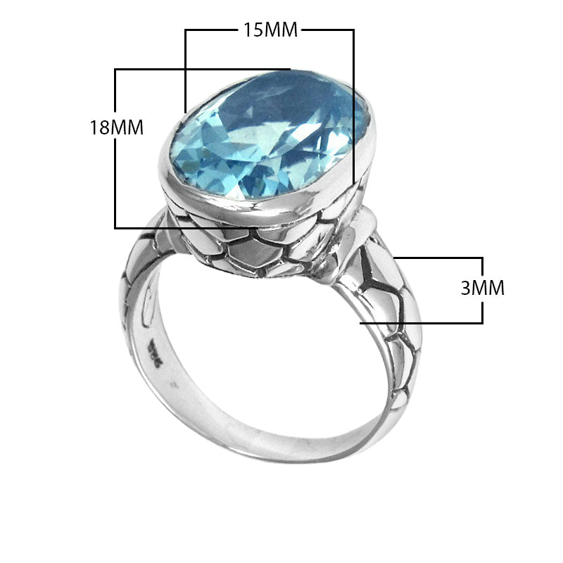Sterling silver wholesale ring with oval Blue Topaz Quartz and textured carved band, handcrafted in Bali.