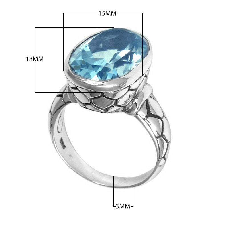 Sterling silver wholesale ring with oval Blue Topaz Quartz and textured carved band, handcrafted in Bali.