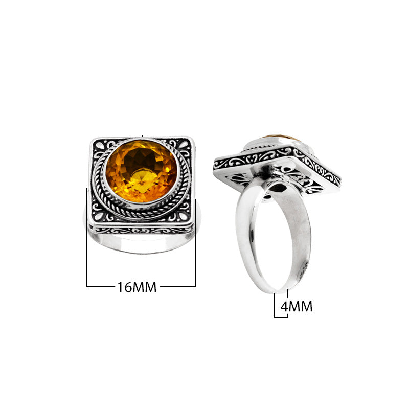 Sterling silver wholesale ring with a round citrine quartz set in a square ornate frame, handcrafted in Bali.