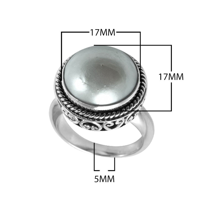 Wholesale sterling silver hematite ring with polished cabochon stone, rope bezel, and Balinese scroll detailing – handcrafted artisan jewelry from Bali.