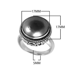 Wholesale sterling silver hematite ring with polished cabochon stone, rope bezel, and Balinese scroll detailing – handcrafted artisan jewelry from Bali.