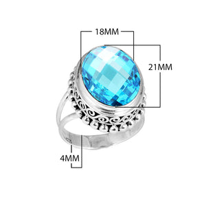 Wholesale sterling silver ring with faceted oval Blue Topaz Quartz, Balinese scroll and bead design – bulk handcrafted statement jewelry.