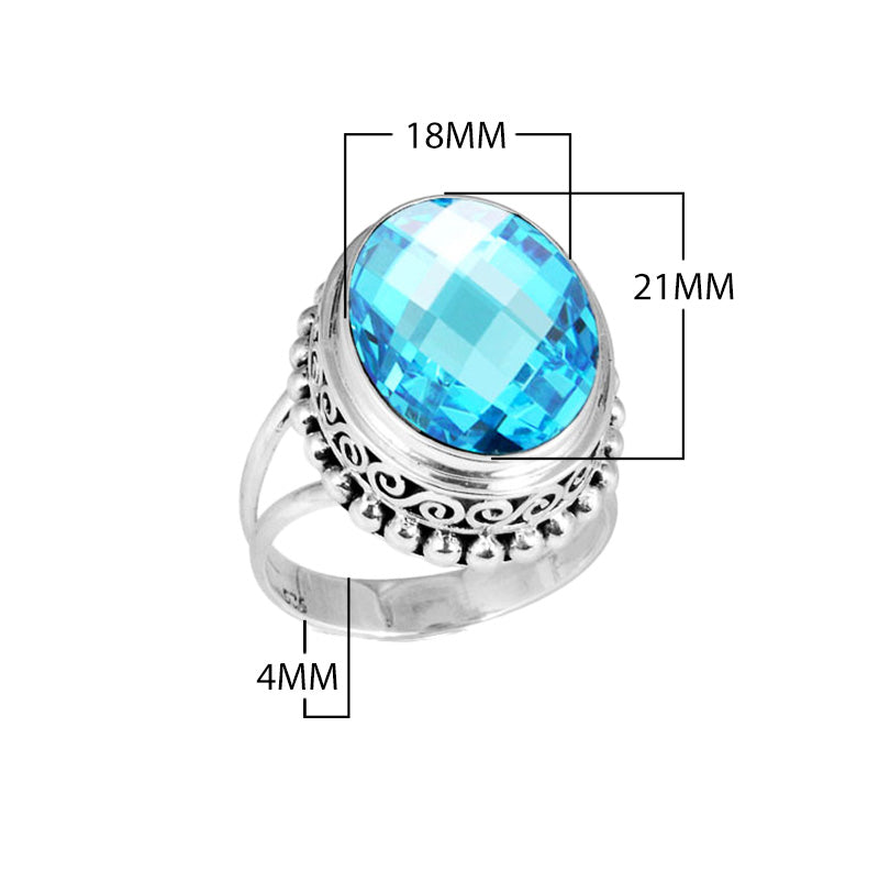 Wholesale sterling silver ring with faceted oval Blue Topaz Quartz, Balinese scroll and bead design – bulk handcrafted statement jewelry.