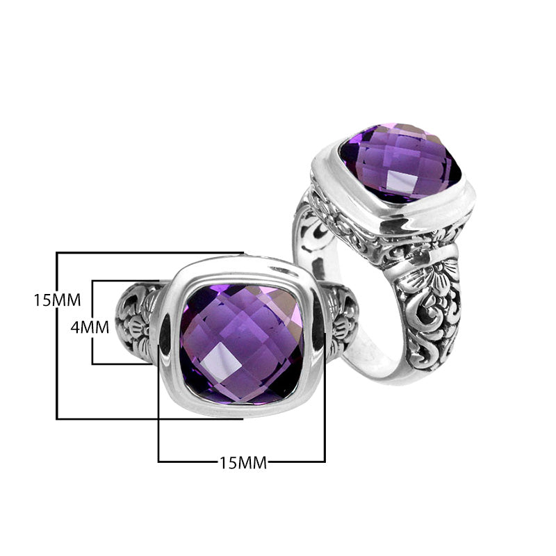 Sterling silver ring with cushion-cut Amethyst Quartz and Balinese carvings.