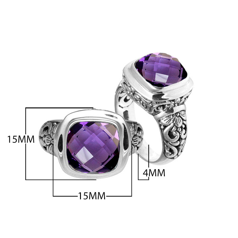 Sterling silver ring with cushion-cut Amethyst Quartz and Balinese carvings.