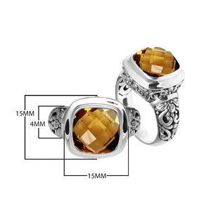 Sterling silver ring with cushion-cut Citrine Quartz and Balinese carvings.