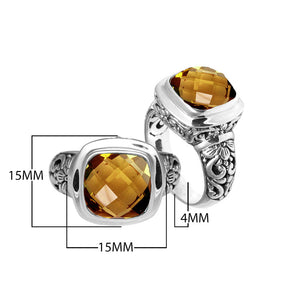 Sterling silver ring with cushion-cut Citrine Quartz and Balinese carvings.