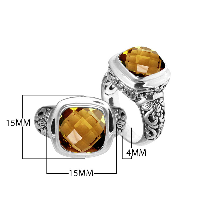 Sterling silver ring with cushion-cut Citrine Quartz and Balinese carvings.