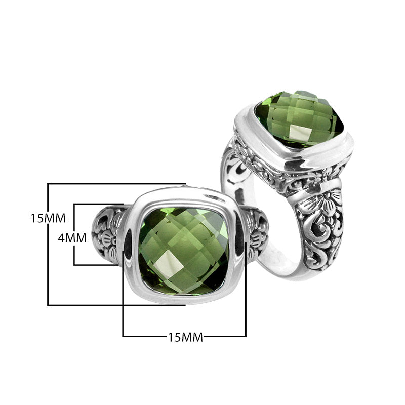 Sterling silver ring with cushion-cut Green Amethyst Quartz and Balinese scroll carvings.