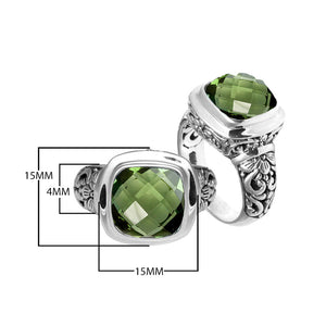 Sterling silver ring with cushion-cut Green Amethyst Quartz and Balinese scroll carvings.
