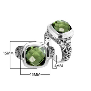 Sterling silver ring with cushion-cut Green Amethyst Quartz and Balinese scroll carvings.