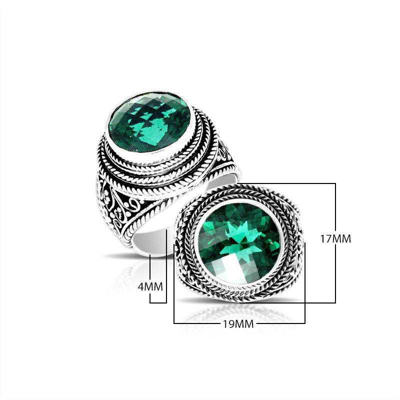 Sterling silver handcrafted Bali ring with round Green Quartz and rope scroll detailing.