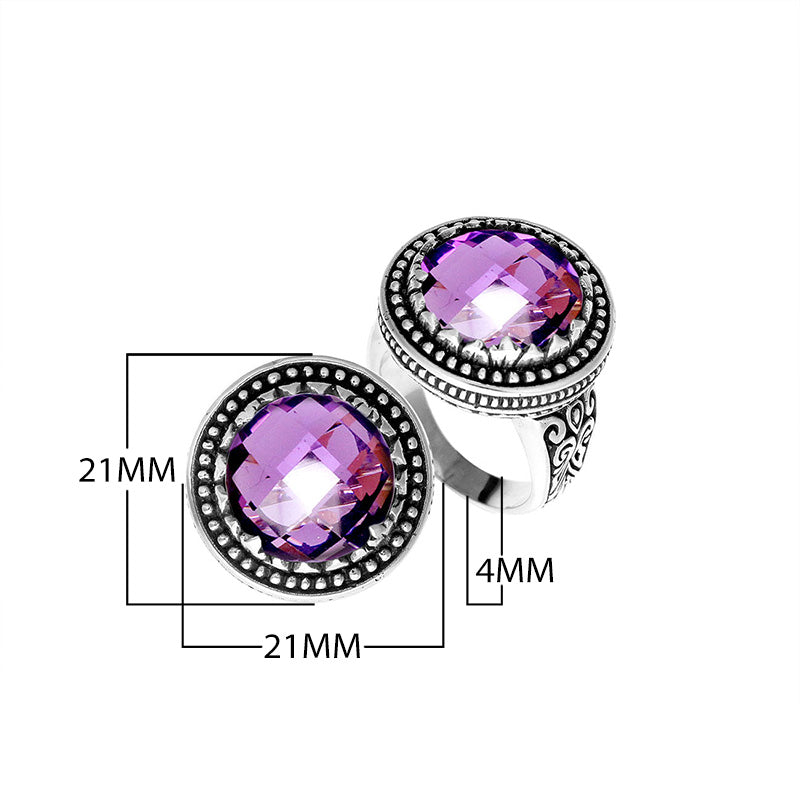 Sterling silver ring with faceted Amethyst Quartz, beaded halo, and Balinese carvings handcrafted in Bali.