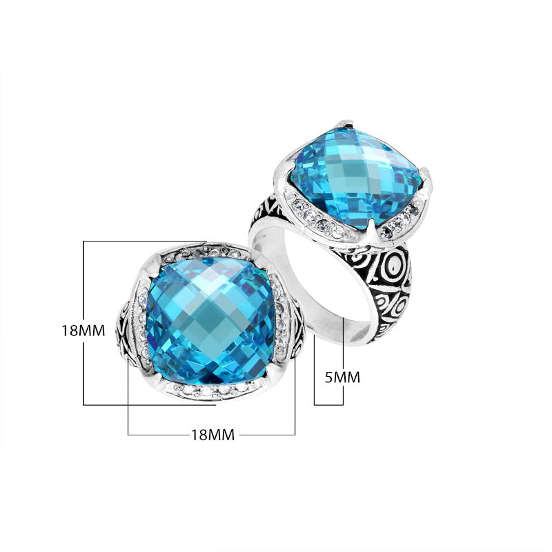 Wholesale sterling silver ring with cushion-cut Blue Topaz Quartz and Balinese carvings, handcrafted in Bali.