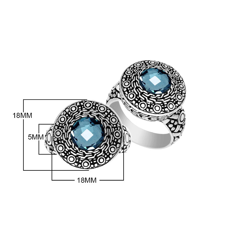 Wholesale sterling silver ring with round Blue Topaz Quartz in an ornate engraved Balinese bezel.