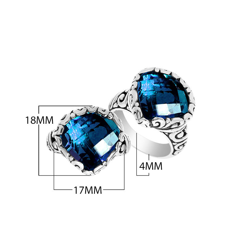Wholesale sterling silver ring with cushion-cut London Blue Topaz Quartz and Balinese scrollwork.