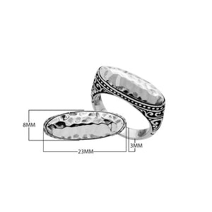 Sterling Silver hammered oval ring with oxidized Balinese scroll detailing
