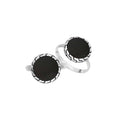 Sterling silver round Black Shell statement ring featuring a smooth dark centerpiece, sculpted decorative border, oxidized detailing, and polished silver band.