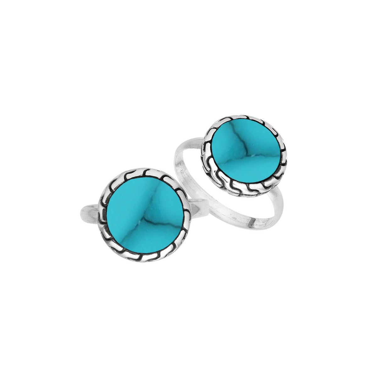 Sterling silver round Turquoise Shell statement ring featuring a vibrant blue centerpiece, sculpted decorative border, oxidized detailing, and polished silver band.