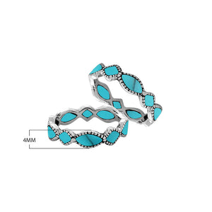 Sterling silver wave pattern ring with Turquoise Shell inlay and Balinese detailing
