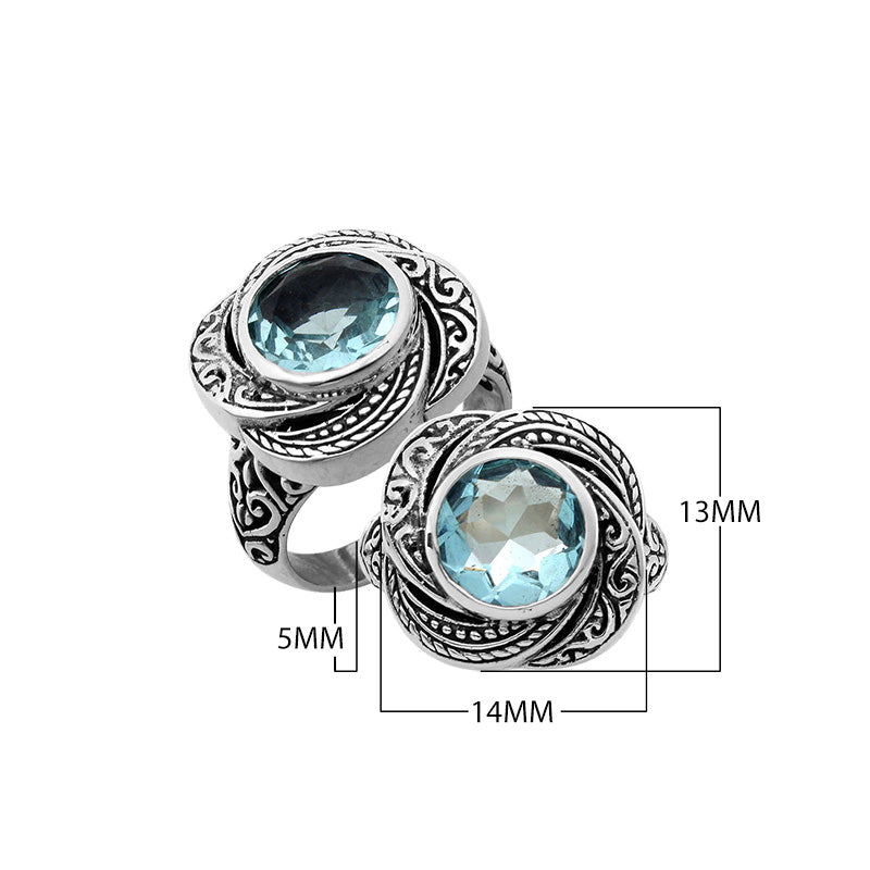 Sterling silver Balinese design ring with round shape Blue Topaz stone