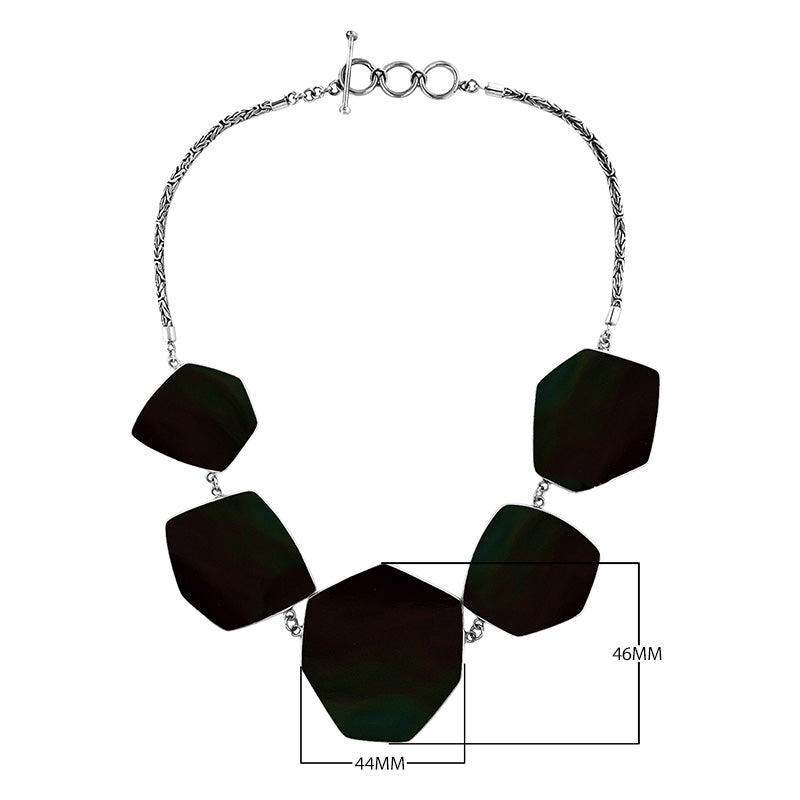 Sterling silver necklace with hexagon black shell links, polished artisan finish.