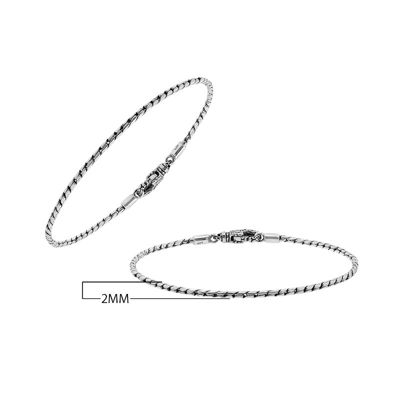 Sterling silver twisted chain bracelet featuring a secure hook lock and polished surface, designed for wholesale jewelry retailers seeking timeless and durable catalog pieces.