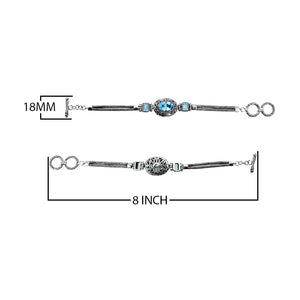 Sterling Silver Bracelet With Blue Topaz Quartz Stones In Oval And Emerald-Cut Shapes With Ornate Scrollwork And Woven Links