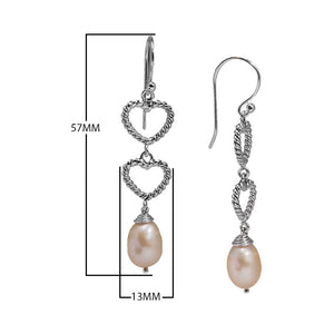Sterling Silver Pink Fresh Water Pearl double heart drop earrings handcrafted in Bali with rope detailing and polished finish.