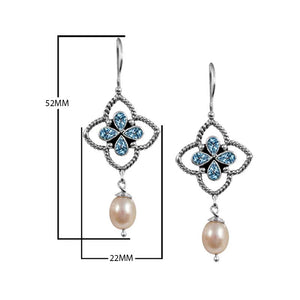 Sterling Silver Fresh Water Pearl and Blue Topaz Quartz floral drop earrings handcrafted in Bali with twisted rope frame and polished finish.
