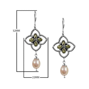 Sterling Silver Fresh Water Pearl and Peridot drop earrings handcrafted in Bali with twisted rope frame and polished finish.