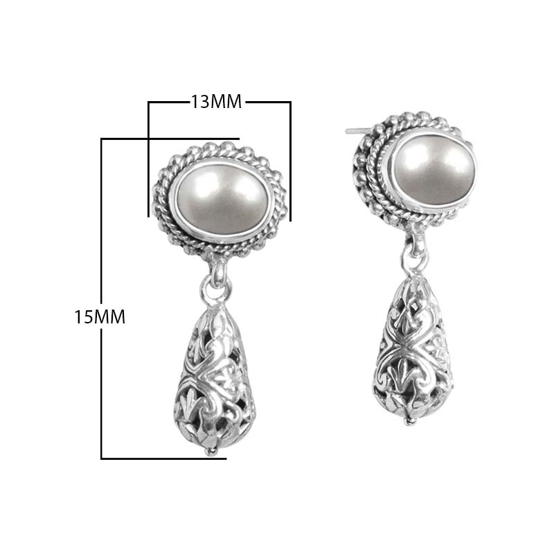 Sterling silver earrings with Mabe Pearl tops and Bali-style filigree teardrop drops.