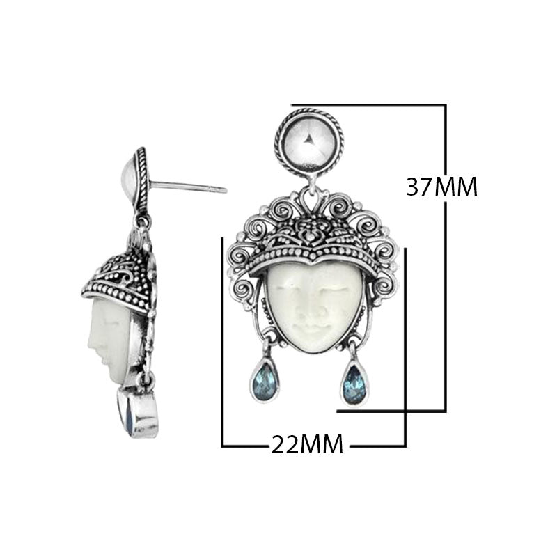 Sterling Silver Carved Bone Face Earrings With Blue Topaz Quartz Teardrop Accents