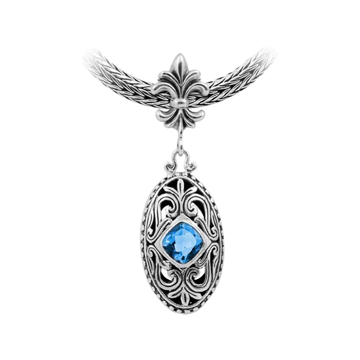 Sterling Silver Ornate Oval Pendant Featuring Blue Topaz Quartz With Fleur-De-Lis Decorative Bail.
