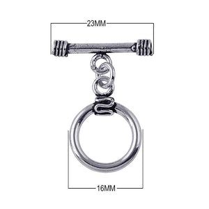 Silver Overlay round toggle clasp with polished finish and bar closure, wholesale jewelry finding for necklaces and bracelets.