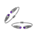 Sterling silver twisted bangle with amethyst quartz ends and Balinese oxidized dot pattern