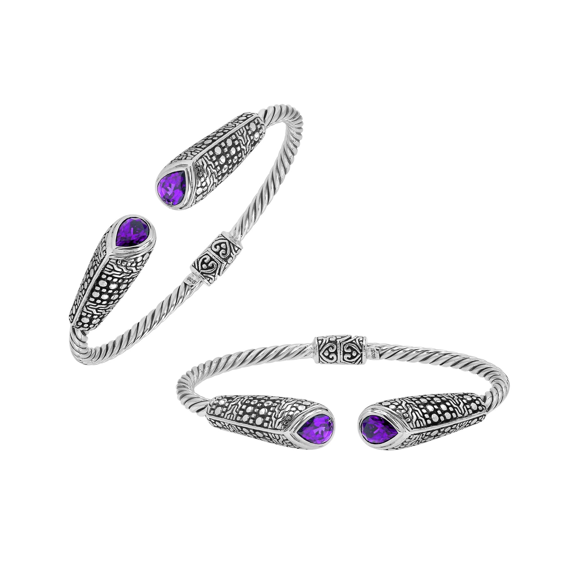 Sterling silver twisted bangle with amethyst quartz ends and Balinese oxidized dot pattern