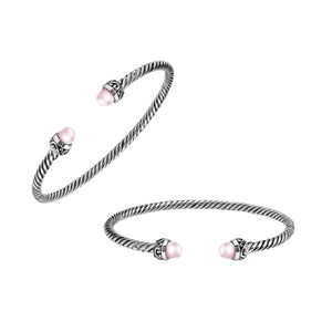 Sterling Silver Twisted Cable Bangle With Pink Freshwater Pearls and Tribal Oxidized Detailing For Wholesale Buyers.