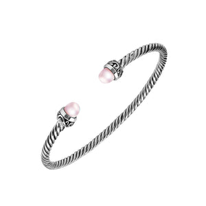 Sterling Silver Twisted Cable Bangle With Pink Freshwater Pearls and Tribal Oxidized Detailing For Wholesale Buyers.