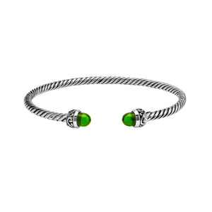Sterling Silver Twisted Cable Bangle With Green Peridot Quartz and Oxidized Tribal Detailing For Wholesale Buyers.