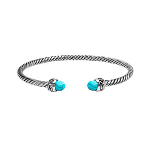 Sterling Silver Twisted Cable Bangle With Turquoise Shell and Oxidized Tribal Detailing For Wholesale Buyers.