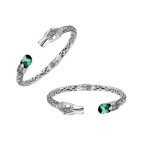 Sterling Silver Dragon Head Bangle with Green Quartz handcrafted in Bali featuring ornate filigree design and oxidized silver finish.