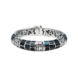 Sterling silver hinged bangle with black shell inlay and ornate filigree design handcrafted in Bali.